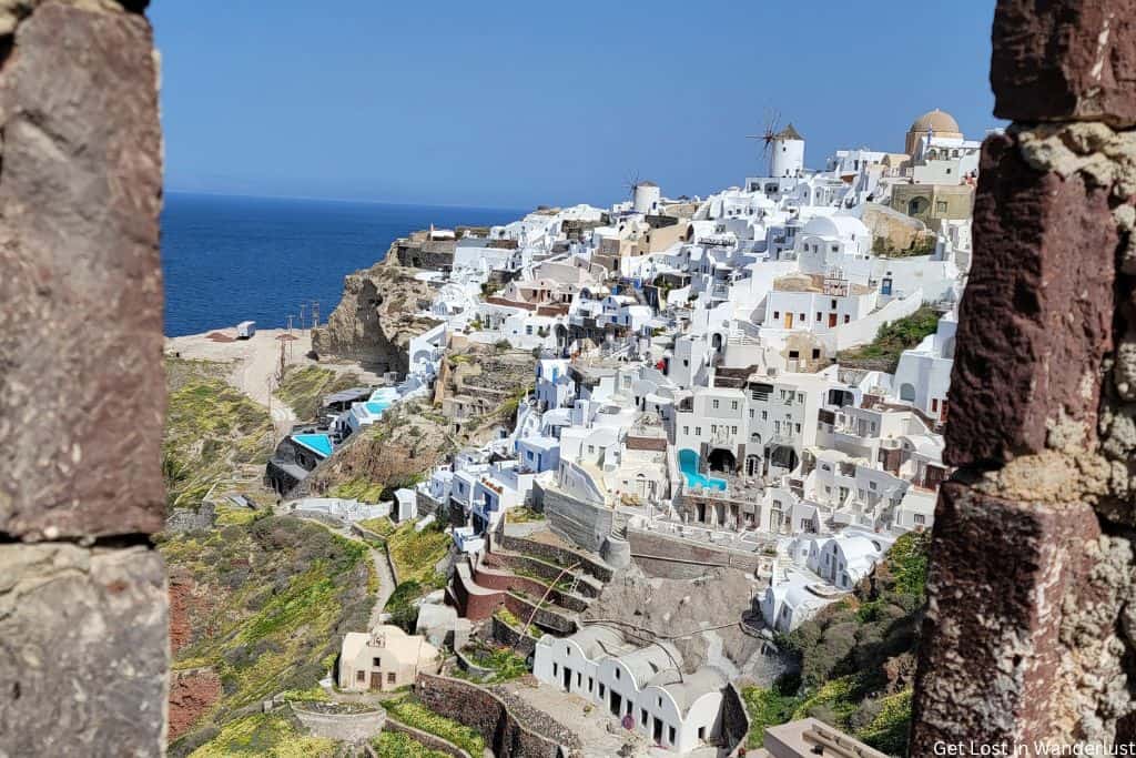 View from Oia, from the Oia Castle while visiting santorini on a budget
