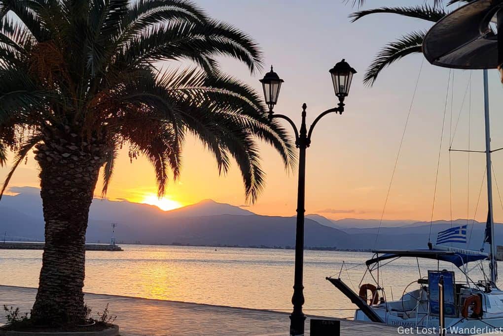Sunset at the Nafplio harbor, a great way to end your road trip in Greece