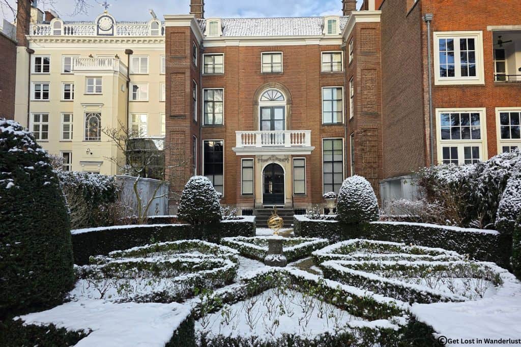 Gardens and exterior of the Museum Van Loon, a historic canal house in Amsterdam.