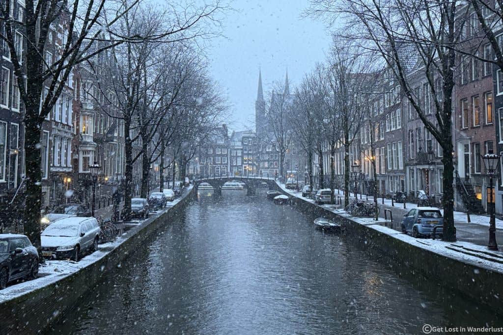 Amsterdam in January, featuring the snowy canals.