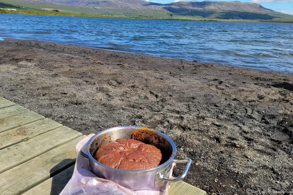 Traditional Icelandic rye bread baking underground using geothermal heat at Laugarvatn Fontana near Iceland's Golden Circle.