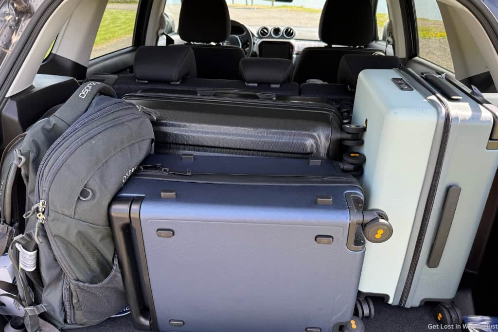 Trunk storage in a Suzuki Vitara from Lava Car Rental showing one checked bag, two carry-ons, and a backpack for an Iceland Ring Road road trip.