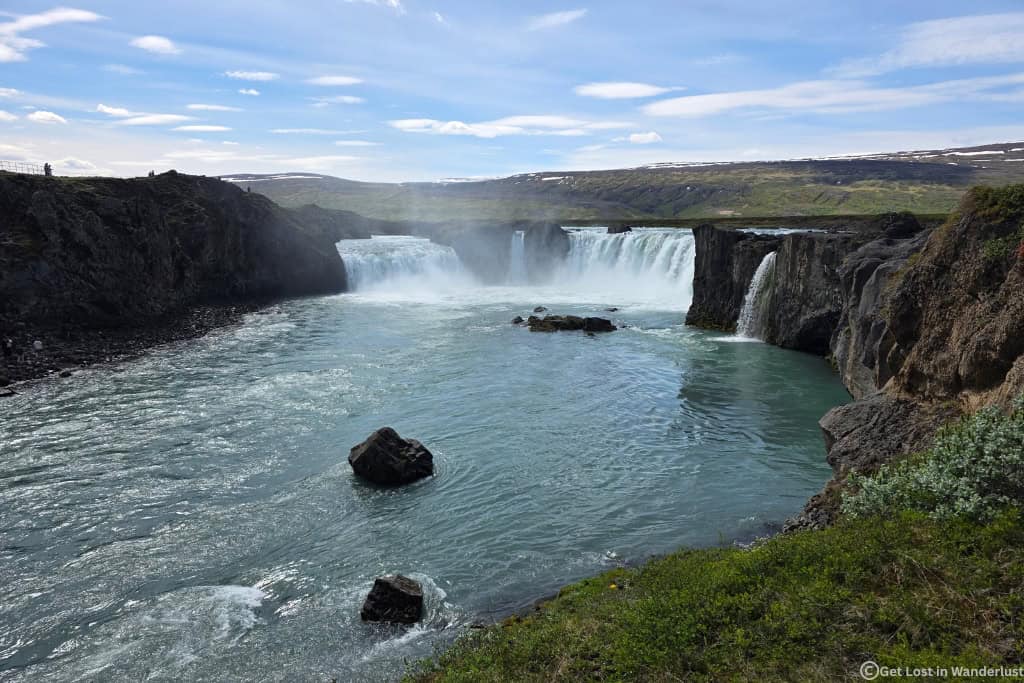 Goðafoss Waterfall near Akureyri, a horseshoe-shaped waterfall and one of the top places to visit in the north if you are driving the ring road in Iceland.
