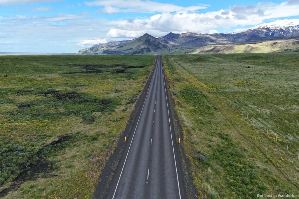 The Ring Road in Iceland, also known as Route 1 which is a continuously paved road that circles the entire country.