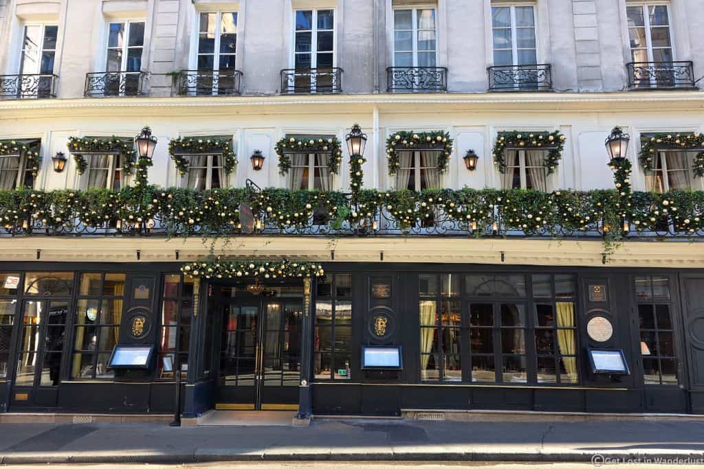 Christmas decorations outside Le Procope in Saint-Germain, Paris